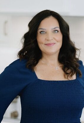 Amy headshot blue top