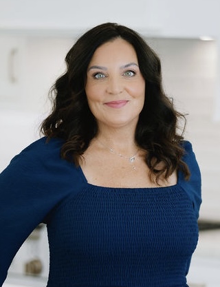 Amy headshot blue top